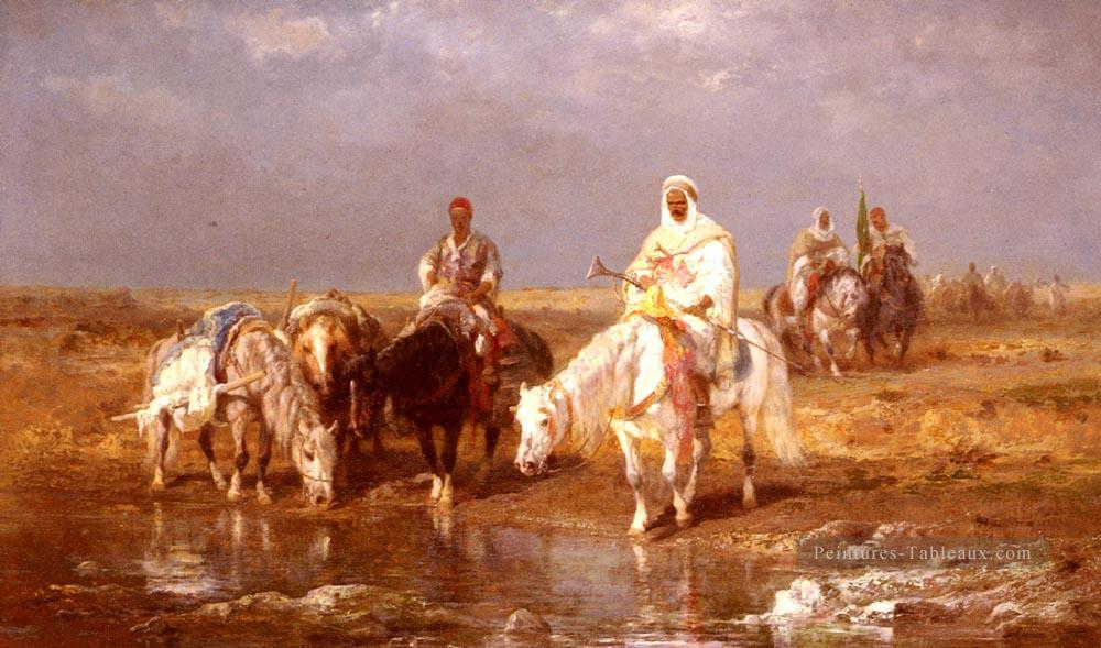 Arabes arrosant leurs chevaux Arabe Adolf Schreyer Peintures à l'huile